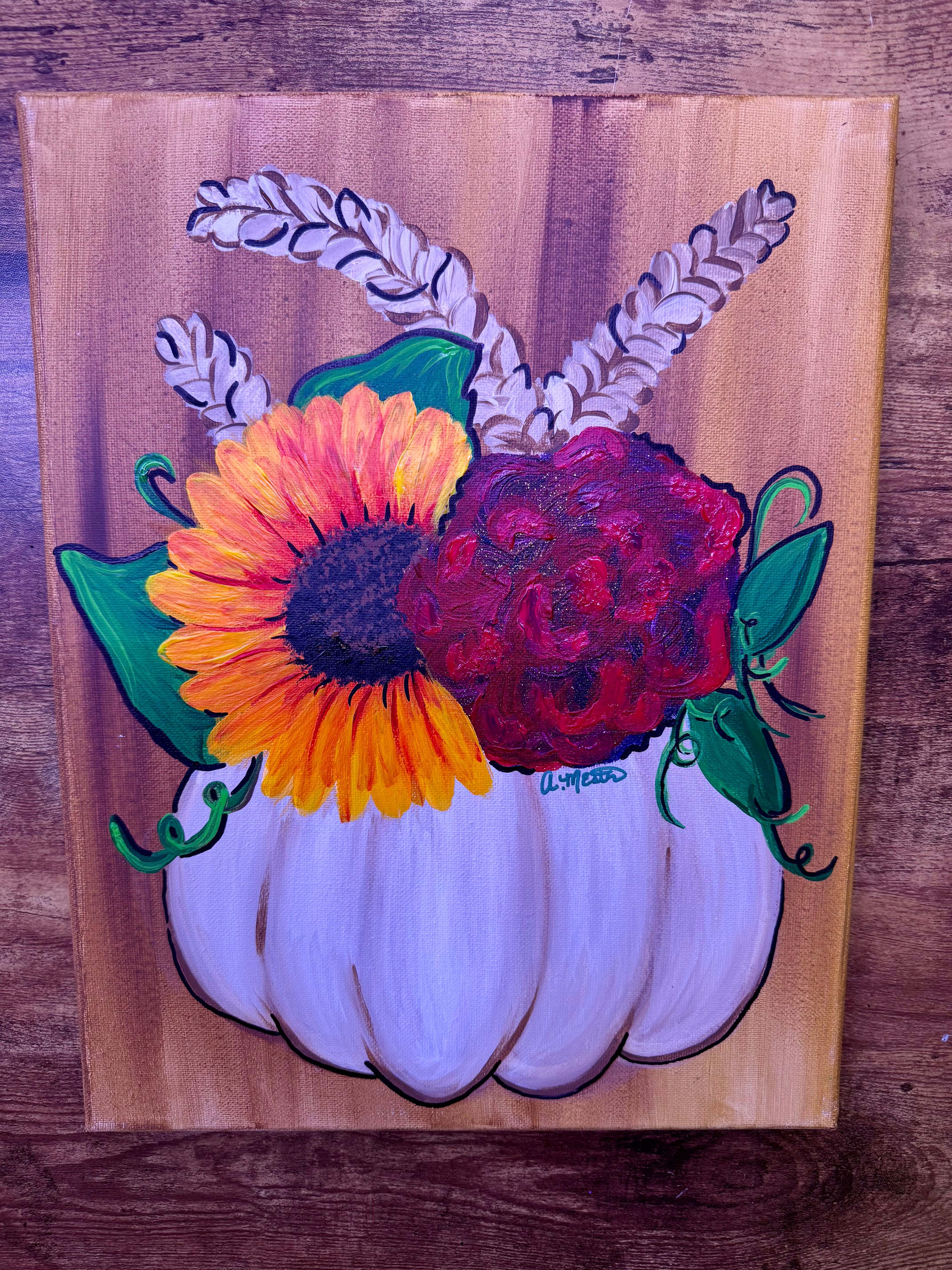 Hand-painted white pumpkin holding a sunflower and deep red peony bouquet with wheat stalks, by A. Mester